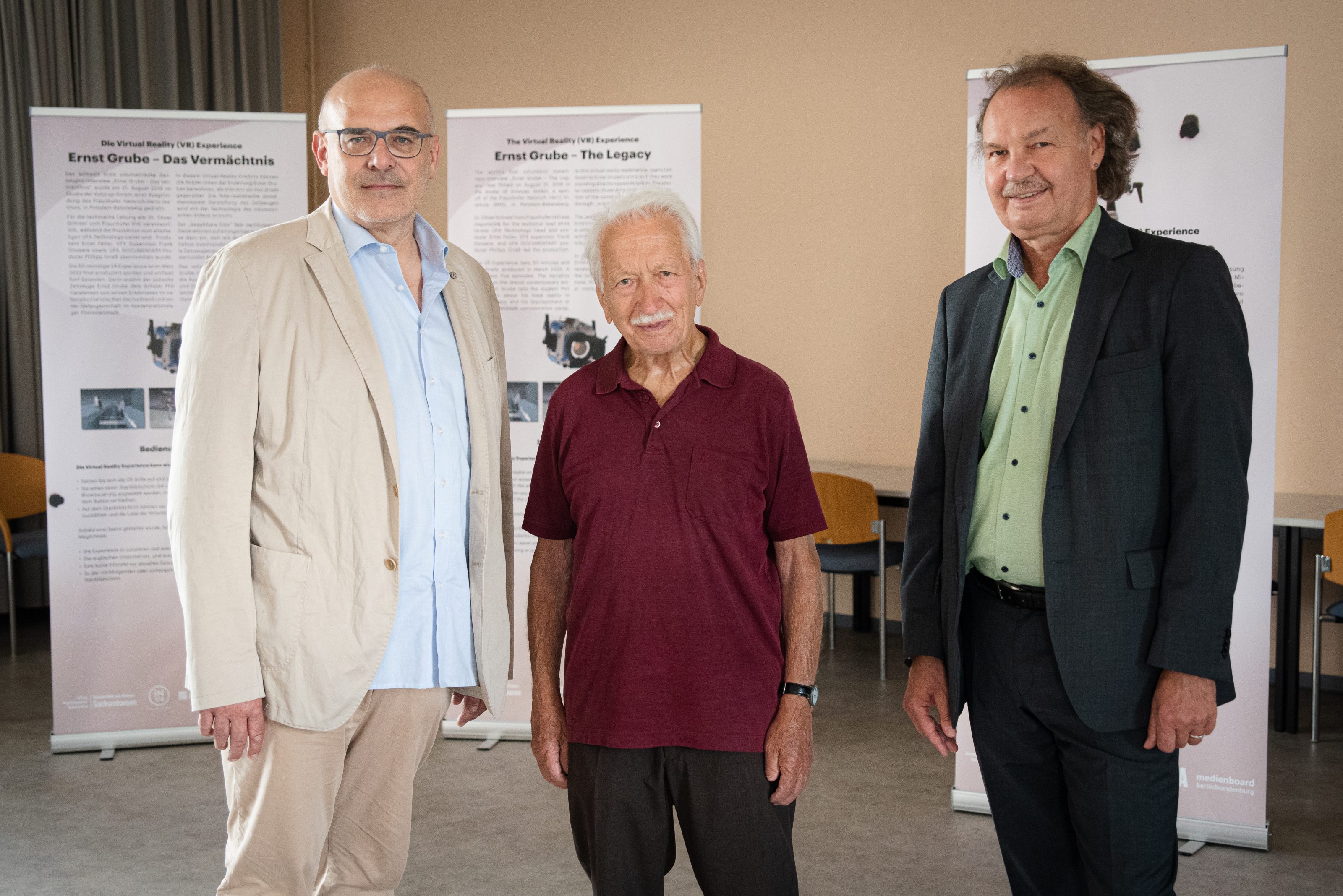 Joachim Kosack (Geschäftsführer UFA und UFA Serial Drama), Ernst Grube (Holocaust-Überlebender und interviewter Zeitzeuge), Oliver Schreer (Gruppenleiter „Immersive Medien und Kommunikation“ am Fraunhofer Heinrich-Hertz-Institut und technischer Leiter des Projekts ERNST GRUBE – DAS VERMÄCHTNIS)